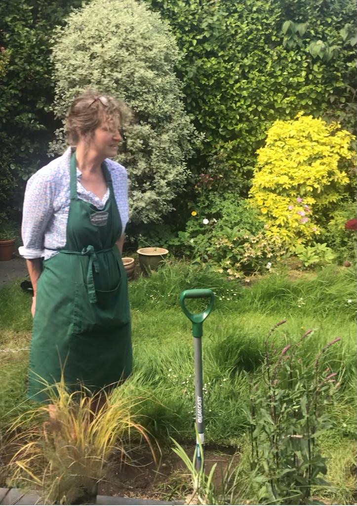 Sue at work in a garden